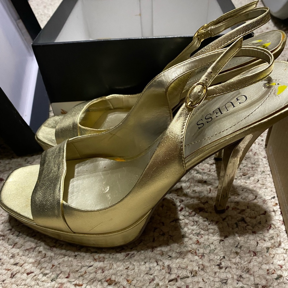 Guess brand 5 inch gold sling back stilettos. Perfect for holiday parties!